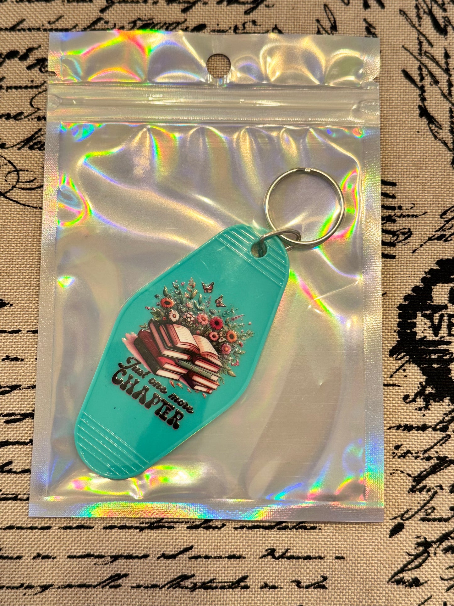 Just One More Chapter – Motel-Style Bookish Keychain