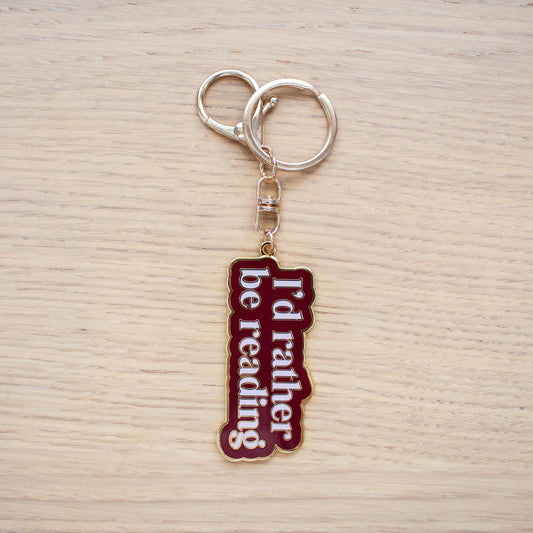 Rather Be Reading Enamel Keychain