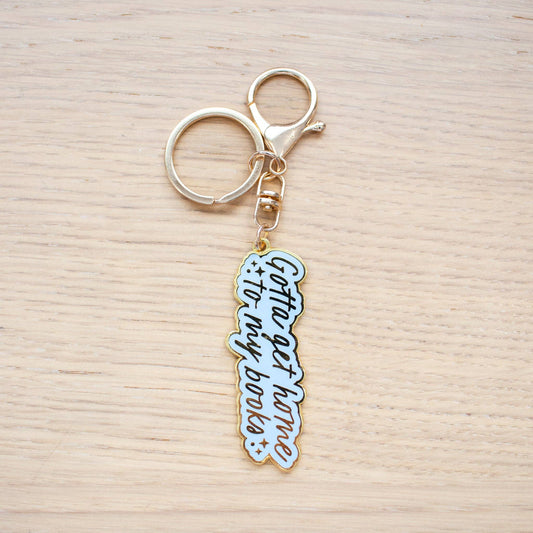 Gotta Get Home to My Books Enamel Keychain